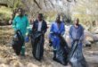 Paulshof Residents and Ratepayers Association cleaning team removes debris and litter from the Braamfontein spruit on June 02, 2026. Photo: Ayanda Ntshingila.