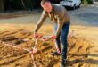 Douglasdale resident Chris Neamann at the corner of Westway and Darter Road, where repeated water leaks and ongoing repairs have left infrastructure damage on June 11, 2026. Photo: Ayanda Ntshingila