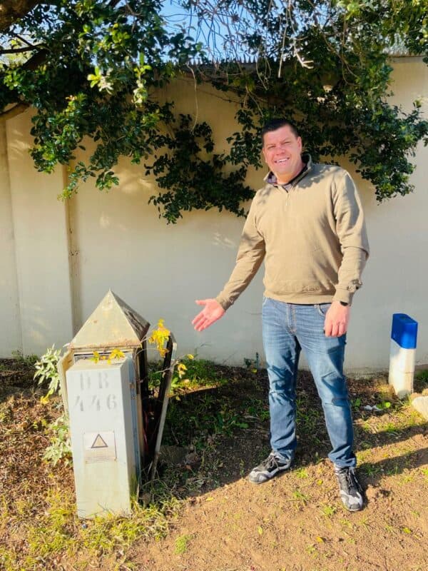 Chris Neumann near an open electricity box in Douglasdale Green Park on June 11, 2025. Photo Ayanda Ntshingila