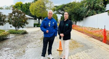 Ward 94 councillor David Foley and Fourways Gardens Estate manager Charlene Marlins on Chorisia Lane before road works began on April 30, 2026. Photo: Ditiro Masuku