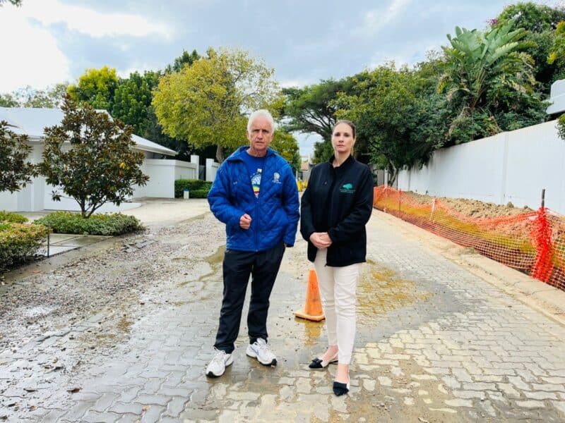 Ward 94 councillor David Foley and Fourways Gardens Estate manager Charlene Marlins on Chorisia Lane before road works began on April 30, 2026. Photo: Ditiro Masuku