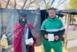Ginger Park residents Tello Shadrake and Lililoro Pitsho show their passport amid reports of planned anti-migration marches. Photo: Ayanda Ntshingila