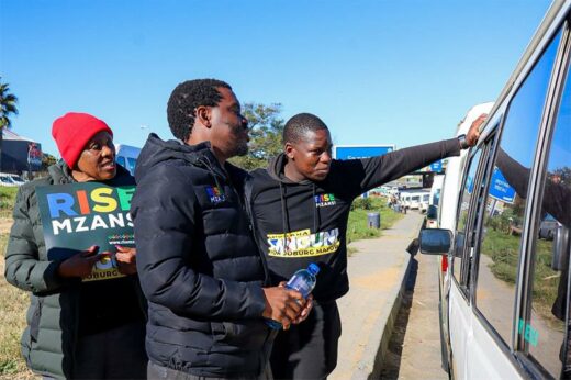 Rise Mzansi mayoral candidate Lukhona Mnguni engages directly with taxi operators at the intersection of Witkoppen Road and Winnie Mandela Drive on June 5, 2026. Photo: Supplied