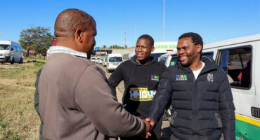 : Rise Mzansi mayoral candidate Lukhona Mnguni engages directly with taxi operators at the intersection of Witkoppen Road and Winnie Mandela Drive on June 5, 2026. Photo: Supplied