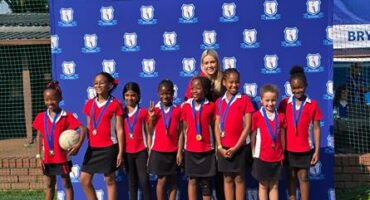 The U9 netball team smiling proudly after winning at the festival. Photo: Supplied