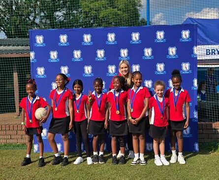 The U9 netball team smiling proudly after winning at the festival. Photo: Supplied