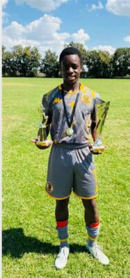 Lutendo Tshikopo, from Valley FC, is now part of the Kaizer Chiefs Youth Development League, as he holds his medals after a tournament. Photo: Supplied