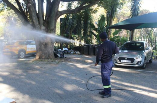 EMS staff member, Ntwanano Mafumo demonstrates how fires are put out on June 2, 2026. Photo: Asanda Matlhare
