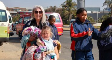 Dainfern College learners spread warmth and kindness to commuters and drivers at the Witkoppen Road taxi rank near Fourways Crossing on July 17, 2026. Photo: Supplied
