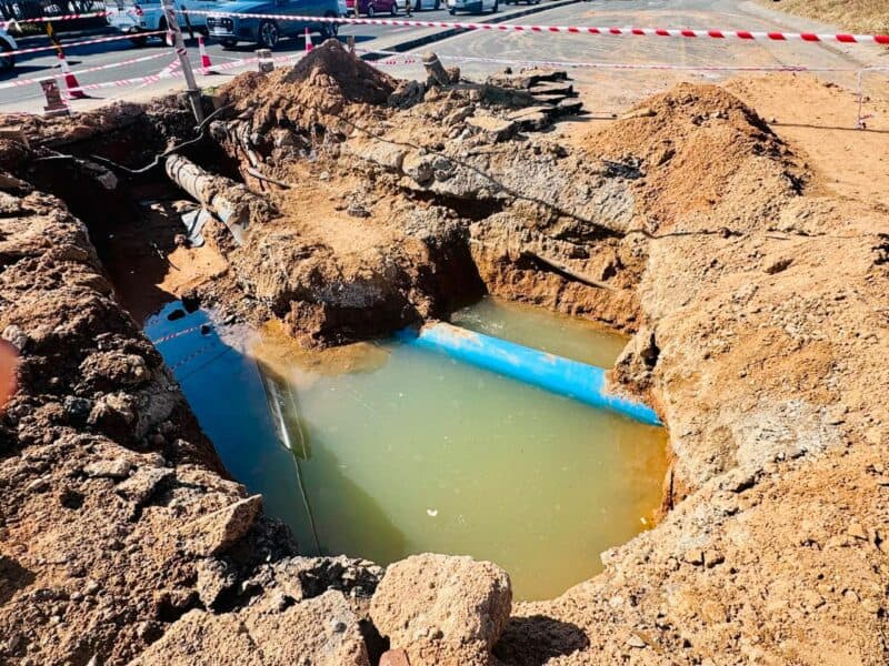The newly discovered leak, located on a bend in the pipeline encased in concrete, has delayed the road reopening. Photo: Supplied