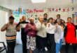 Sekunjalo sign language class makes a ‘I love you’ sign. Photo: Reitumetse Gugushe