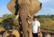 Kyle Malyon with the elephants from the Herd Trust. Photo: Supplied