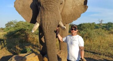 Kyle Malyon with the elephants from the Herd Trust. Photo: Supplied