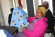 Rachel Wanyane, a member of the Tshwarafa Oldie Club, showcases her work, which she did during the club's daily meeting on July 17, 2026. Photo: Ayanda Ntshingila