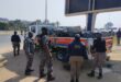 Heavy machinery and clean-up teams work to restore the site after an illegal occupation was removed near Fourways Crossing. Photo: Supplied