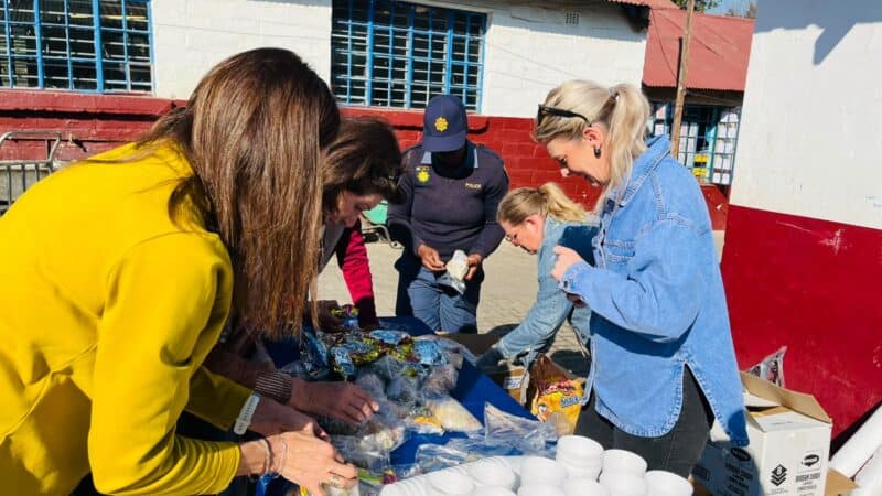 Douglasdale police officers and community members join hands to make a difference during the women’s month outreach at Witkoppen Primary School on August 5, 2026. Photo: Ditiro Masuku