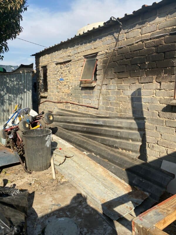 The remains of the burnt shack along with toys on August 28,2026. Photo: Reitumetse Gugushe