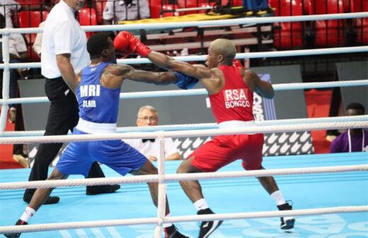 Merven Clair eats a huge left from Simnikiwe Bongco at the 2022 Commonwealth Games in Birmingham. Photo: Supplied