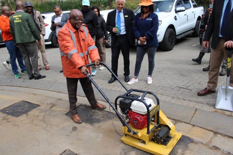 Morero took part in the hands-on pothole repairs, highlighting the city’s commitment to working with residents and community organisations to improve local service delivery and road infrastructure on September 8, 2026. Photo: Ayanda Ntshingila