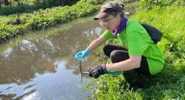 Nativel uses a WaterCAN citizen-science testing kit to collect and test river water for indicators including E. coli and other measures of water quality on September 26, 2026. Photo: Ayanda Ntshingila