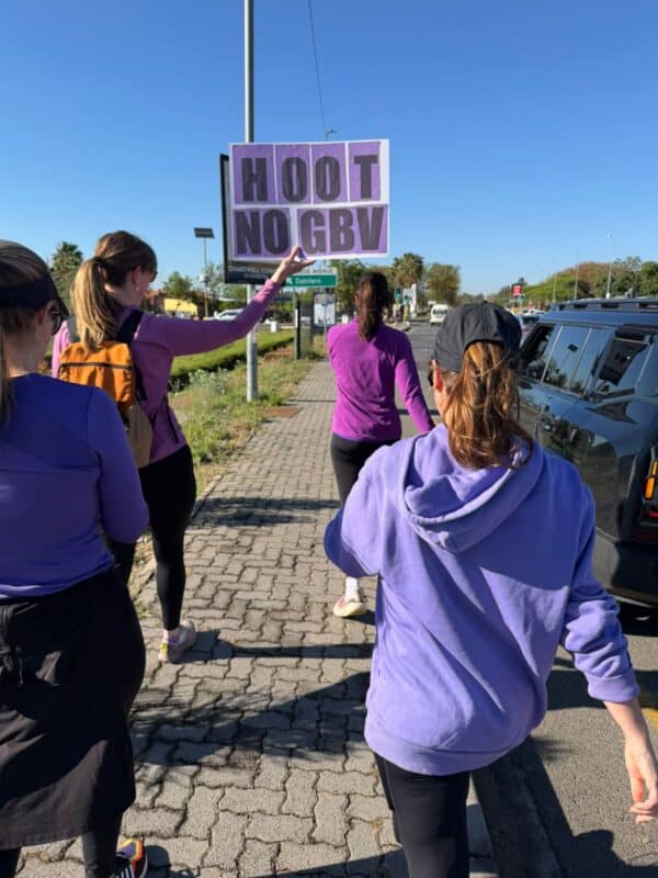Women from the community take to the streets of Broadacres carrying a ‘Hoot GBV’ sign as they raise awareness and stand in solidarity with victims and survivors of gender-based violence on October 1, 2026. Photo: Ayanda Ntshingila