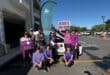 The group of women, who joined the community walk, stand together in purple in support of victims and survivors of gender-based violence on October 1, 2026. Photo: Ayanda Ntshingila