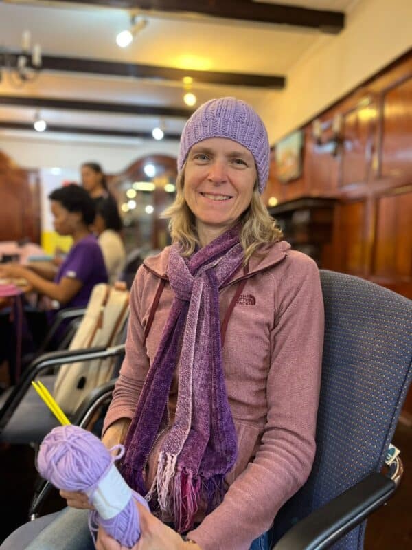 Karen Lindstrom proudly wears a beanie she made in just a few minutes on October 1, 2026. Photo: Ditiro Masuku