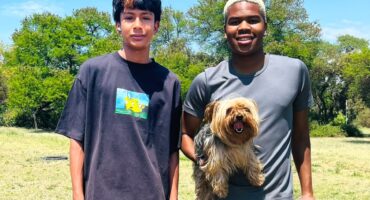 Micah and Emilio Enoch enjoy a day out with their furry friends. Photo: Ditiro Masuku