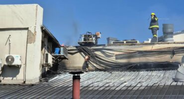 A view from the scene at Lonehill Shopping Centre following the morning fire. Photo Supplied