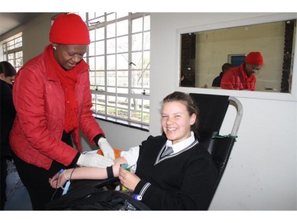 Seen donating blood during the blood drive at St Dominic’s Catholic School for Girls is Sinead Fletcher. With her is Princess Sithole (donor attendant).