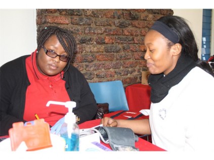 Keneilwe Radinne is seen helping Jemima to fill the consent form to donate blood during the blood drive at St Dominic’s Catholic School for Girls on Wednesday, July 24.