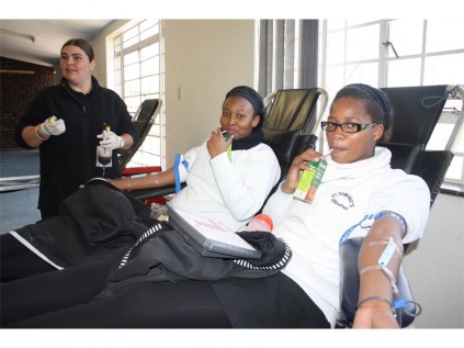 Seen are Grade 12s Sanda Myandu and Jemima Twala, donating blood during their school’s collection blood drive on Wednesday, July 24.