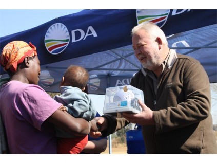Seen here are the solar light beneficiaries with Erick Dorner.