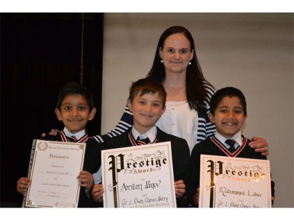 Gr 2K pupils from Summerfields Primary School who performed and excelled at the Benoni Eisteddfod.Back: Kerry Curtis (teacher) Front: (from left) Mohammed Taariq Saib, Ariton Panev and Muhammed Laher.