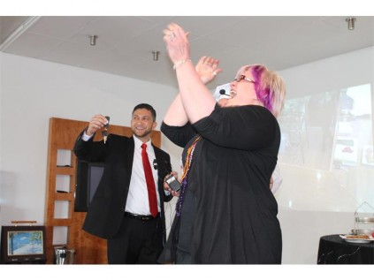 Sanet celebrates as S4 Auto dealer principal Mohammed Paruk hands her the keys to her new car