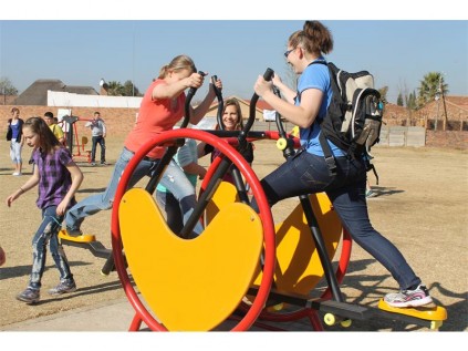 Megan Viljoen and Melissa Lourens work out on the new park equipment.