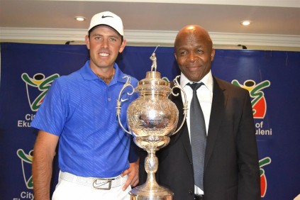 Championship material 2011 Masters Champion Charl Schwartzel and Ekurhuleni executive mayor Cllr Mondli Gungubele pose with the coveted trophy that the winner of the 103rd SA Open Golf Championship will lift come November 24.