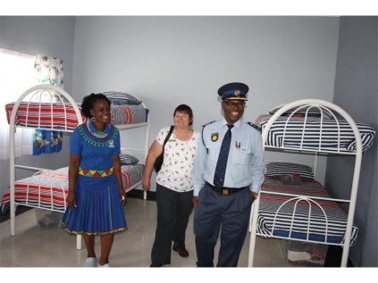 Those who attended the event were also given a chance to tour the new facility. Seen in the boys' dormitory, are (from lleft) Zandi Madlala, Clr Hillary Coke and Brig Manyathela.