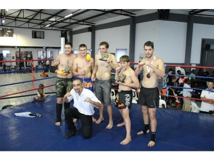 Seen here are members of the club. Back (from lef) Bobby Borislav (gold), Jordan Lee Nell (one gold and one silver), Gerhardt Kachelhoffer (gold), Junior Smit (gold), and Dean Talken (silver). Front: Kru Lloyd Kemertgoglou (coach).