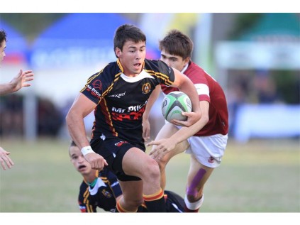 EG Jansen midfielder Erich Cronje attempts to escape Kearsney wing, James Tedder.