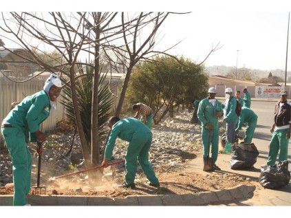 This group of young people employed through the Lungile Mtshali Community Development Project helped clean up several streets in Reiger Park, on Mandela Day.