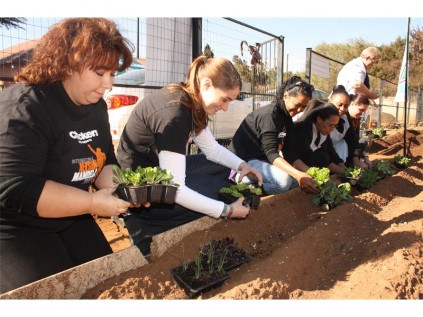 Checkers, in conjunction with one of its suppliers, Goosebumps, visited the Reiger Park Crisis Centre and provided service, resources and goods to assist the needy organisations. Seen planting vegetables are Checkers employees (from left) Ronel Kraukamp, Pamela Cloete, Sufura Sheriff, Anthea Jaftha, Sharon Flank, Alida van Rooyen and Ansie can der Watt.
