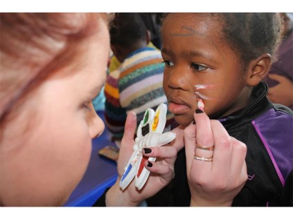 The children at St Francis enjoyed a day of entertainment on Mandela Day, which included having their faces painted.