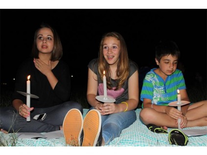 Seen spreading the festive cheer are (from left) Kayla Simoes, Michelle Human and Jared Simoes.