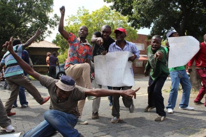 Community members, protested outside the premises, while a group of police members was also toy- toying in the boardroom of the station, both demanding that, Govender be removed immediately.