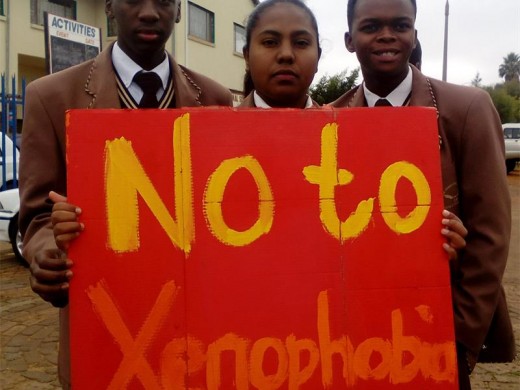 Seen here, saying no to xenophobia and racism, are Butholenkosi Ntabeni (left), Andrea Ratty, and Katlego Mahlaole.
