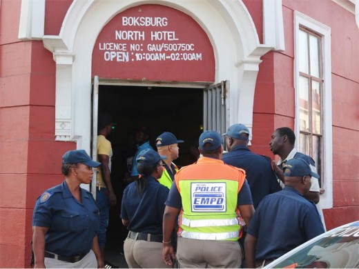 The raid at the Boksburg North Hotel, where numerous undocumented persons were arrested.