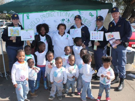 St Francis Care Centre, with Boksburg North SAPS, raised awareness on child abuse by camping out at the East Rand Mall taxi rank on Friday, June 10. Seen here with children from the St Francis Care Centre are (back, from left): W/O Vanessa Fourie, Nomazizi Phahlamohlaka (social auxiliary worker), Louise Amond (nursery school teacher), Lieut-Col Ydré van Graan, Capt Juanita Coetzer and Sgt Nic Muller.
