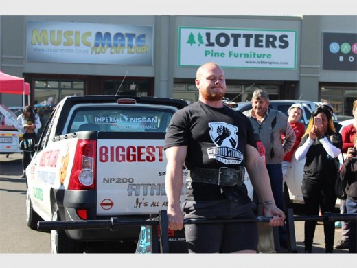 Jean van der Have of team Brotherhood during the car deadlift round.