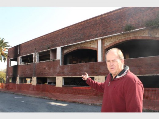 Seen with his spokesperson Zweli Dlamini (right), the Mayor of Ekurhuleni, Clr Mondli Gungubele led the demolishing of the dilapidated buildings in Market Street, Boksburg, on Wednesday, June 1.